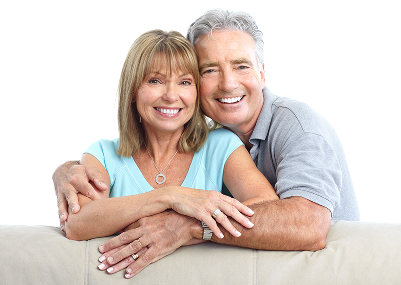 Senior Happy Couple With Dental Implants From Encino Smile Design